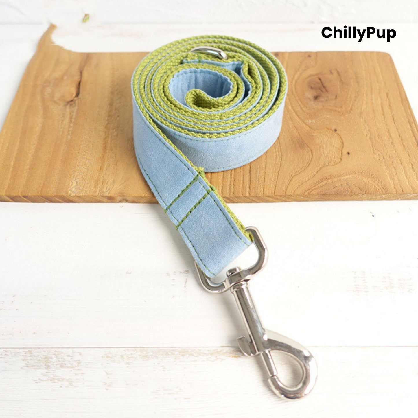 Light blue dog collar and Lead set on a wooden board with 'ChillyPup' branding.
