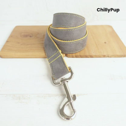 Grey and yellow dog leadwith a clip on a white background, branded 'ChillyPup'.
