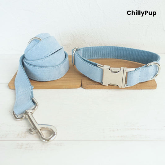 Light blue dog collar and Lead set on a wooden board with 'ChillyPup' branding.