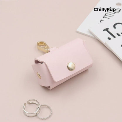 pink leather ring pouch with gold accents on a light pink background, featuring the brand 'ChillyPup'.