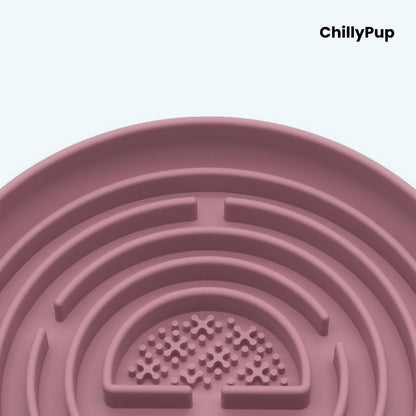 Pink pet bowl with maze design on a light purple background, branded 'ChillyPup'.